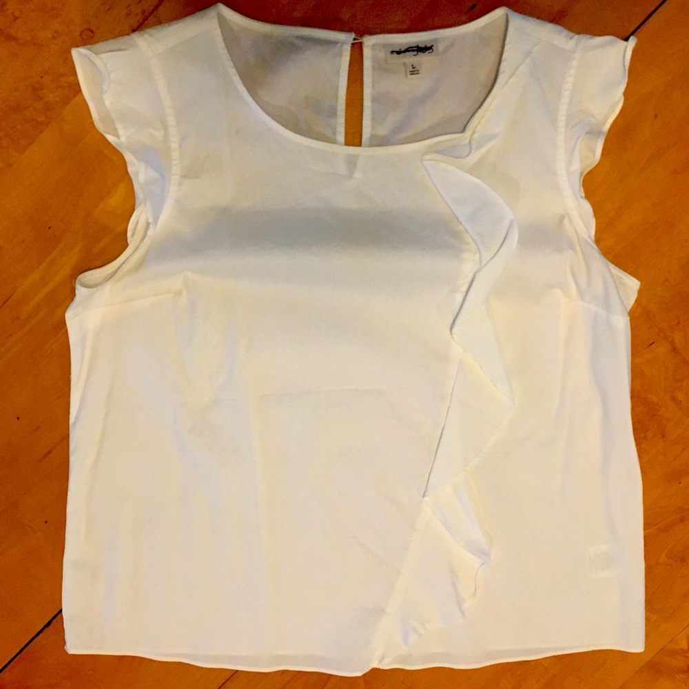 White ruffle blouse